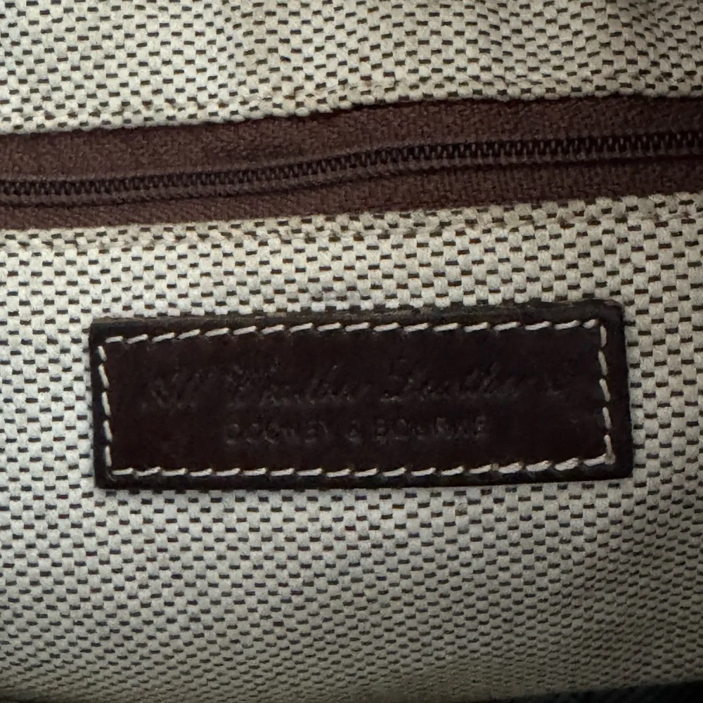 Dooney & Bourke Pebbled Leather Drawstring Bag - Picture 7 of 13